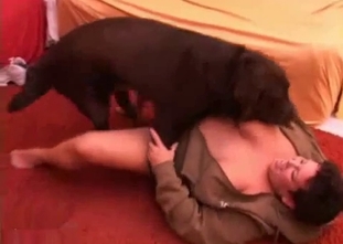 Fat busty lady and her big black dog