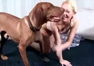 Watch a model fucking with a massive dog